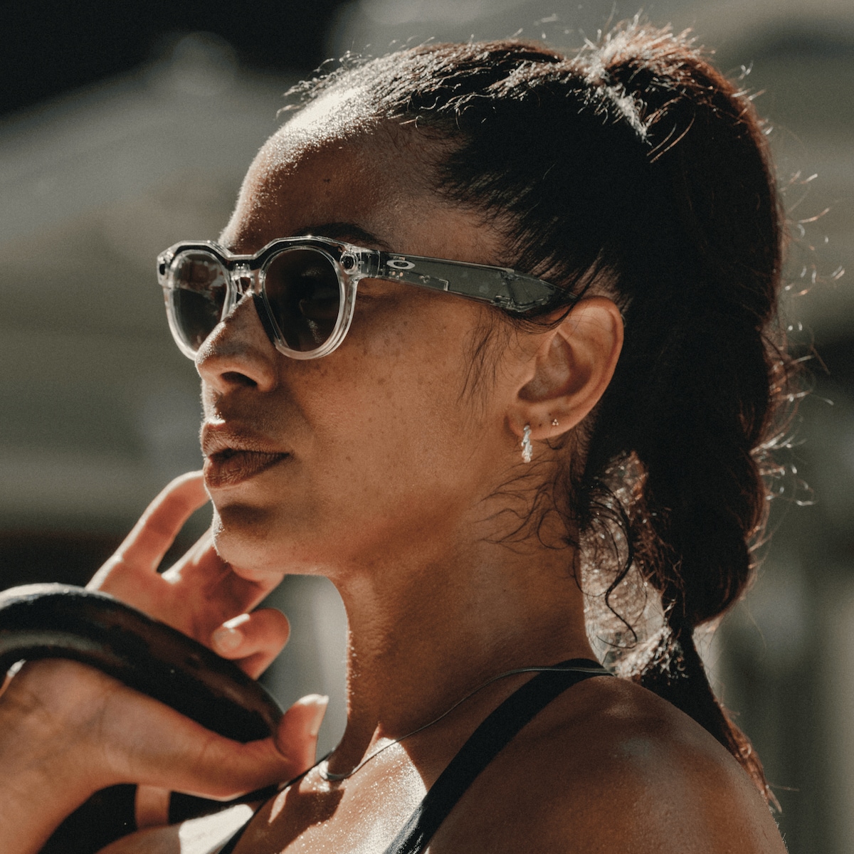 Person wearing Oakley Meta HSTN smart glasses