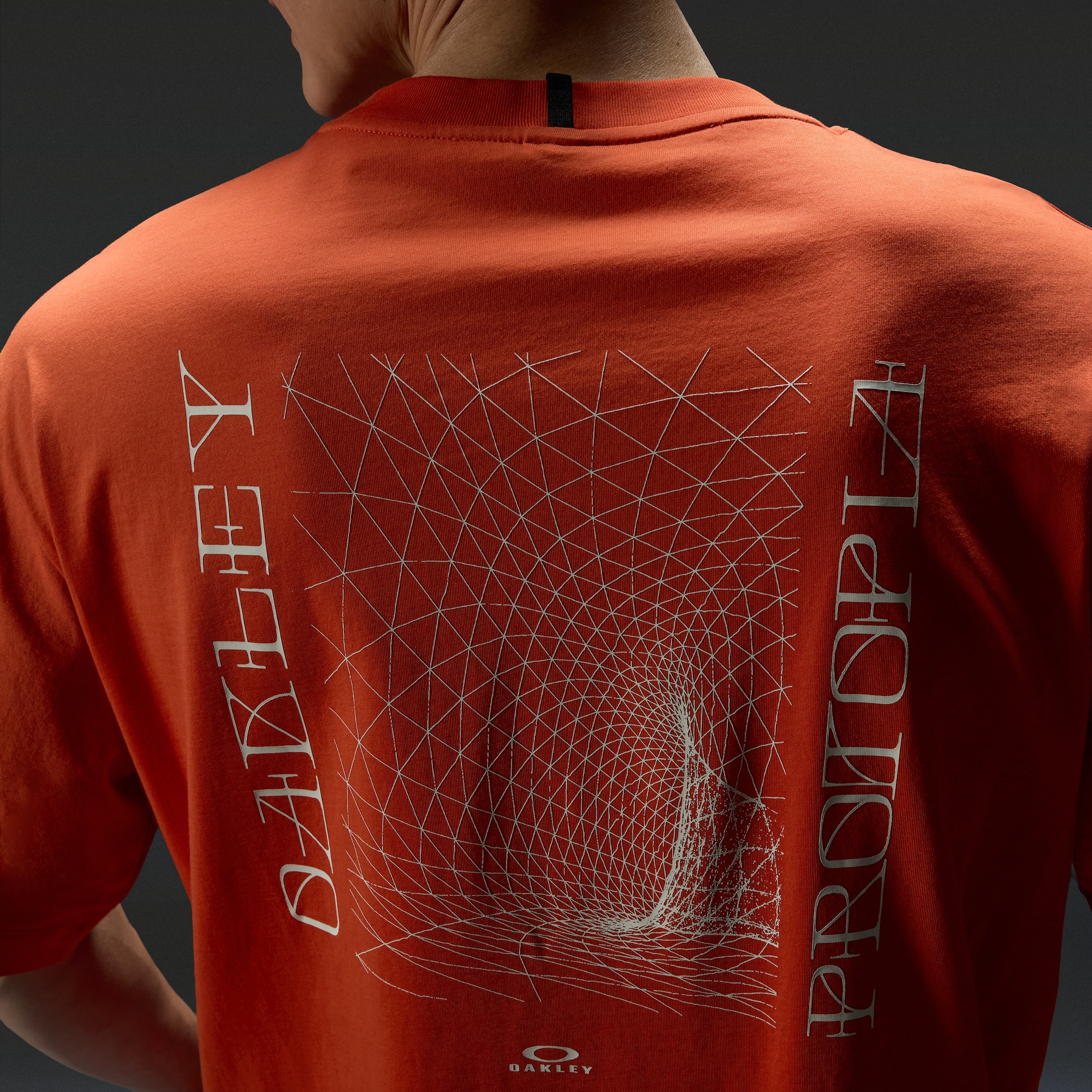 Oakley Reserve Momento Protopia Tee in Aviator Orange | Oakley® US