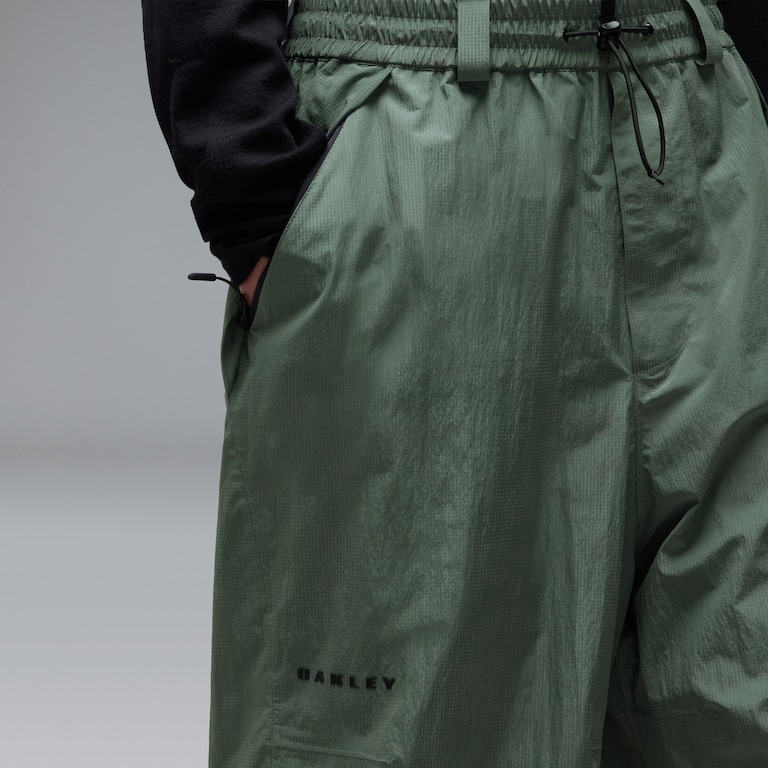 Channel Glow Shell Pant ​ - Reflective Camo Av Green
