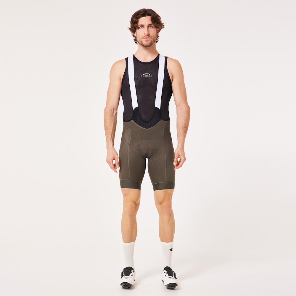Oakley X Pas Normal Studios Mechanism Bibs in Black Olive | Oakley® US
